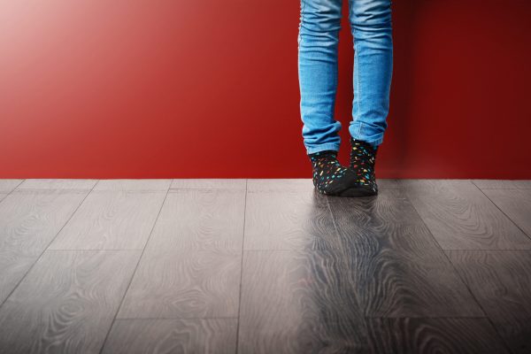 Cosy socks inspire happy feet. Cropped studio shot of a woman wearing jeans and socks
